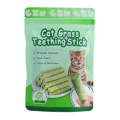 Cat grass teething stick packaging with a green background and cat illustration.