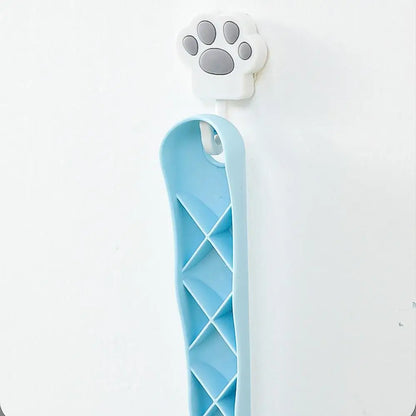 Blue pet leash with paw-shaped handle on a white background