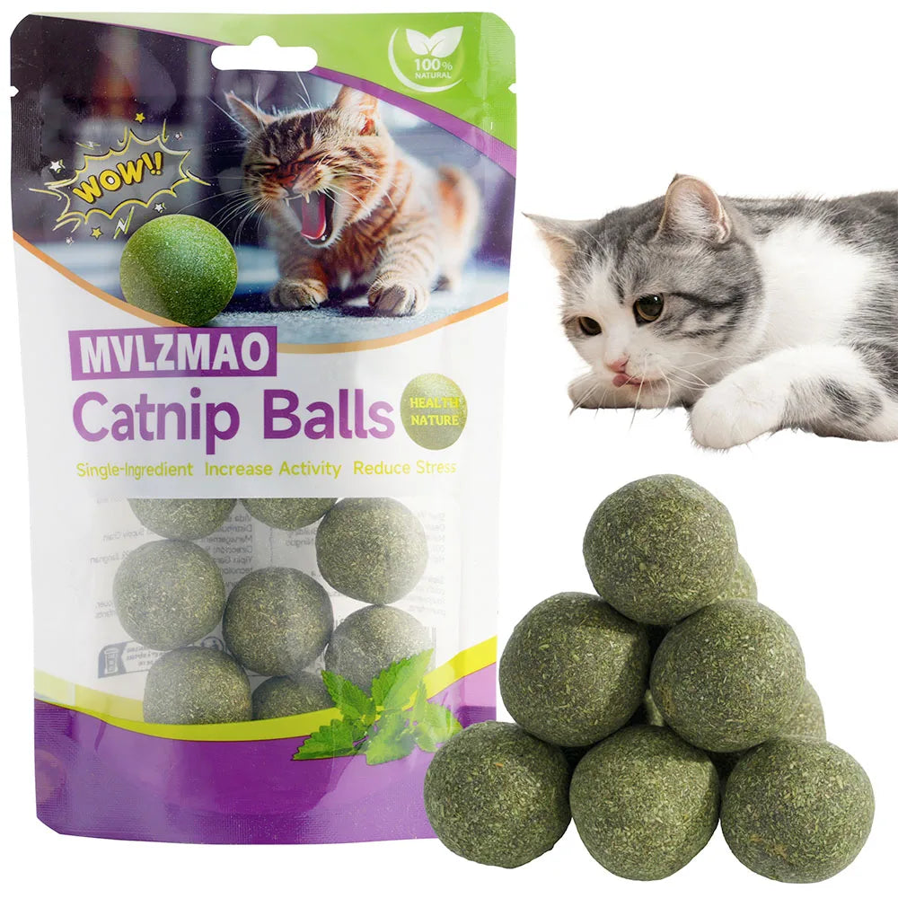 Catnip balls with packaging and a cat looking at the camera.