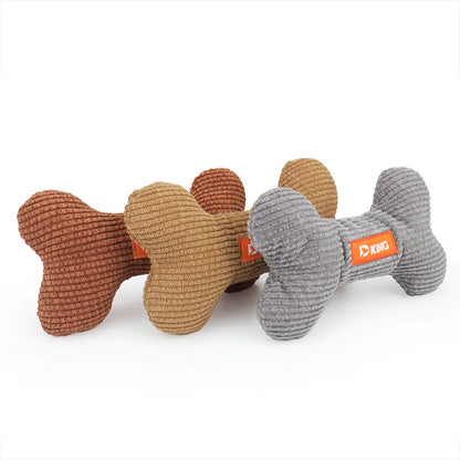 Set of bone-shaped dog toys in brown and gray with an orange label on a white background
