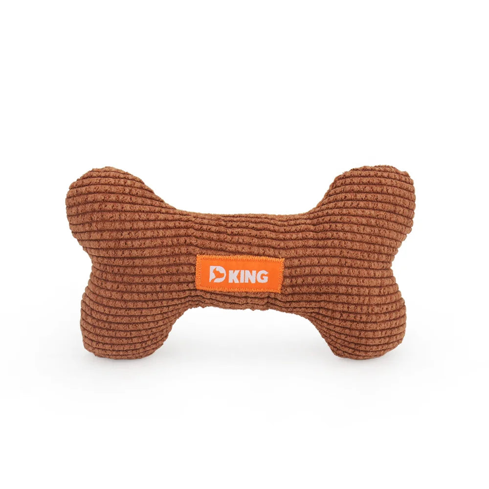 Brown bone-shaped dog toy with a KING logo on a white background